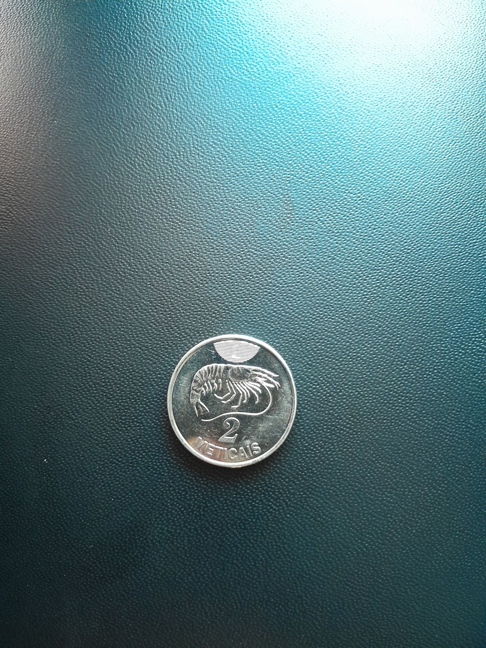 Pièce de monnaie de 2 meticais du Mozambique photo gratuite