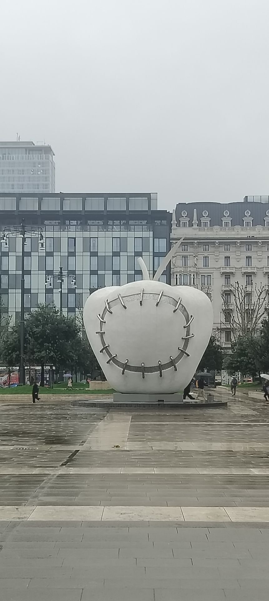 Apple sculpture, Mela Reintegrata, in front of Milan railway station Lombardy Italy free photo