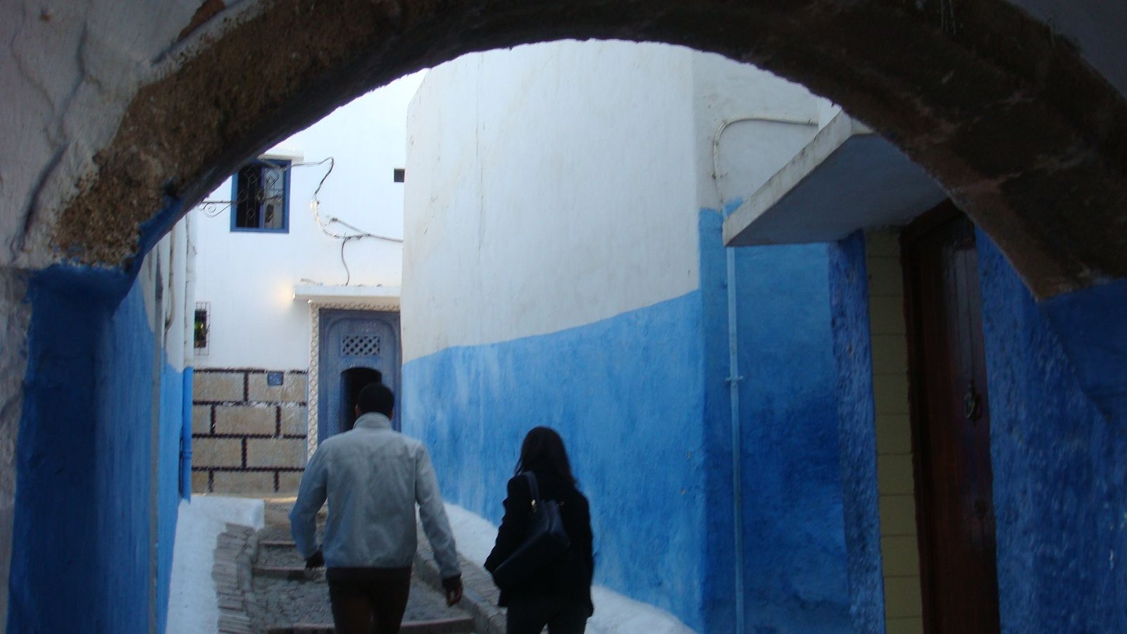 Passage under the arch in the street of the Kasbah of the Oudayas free photo