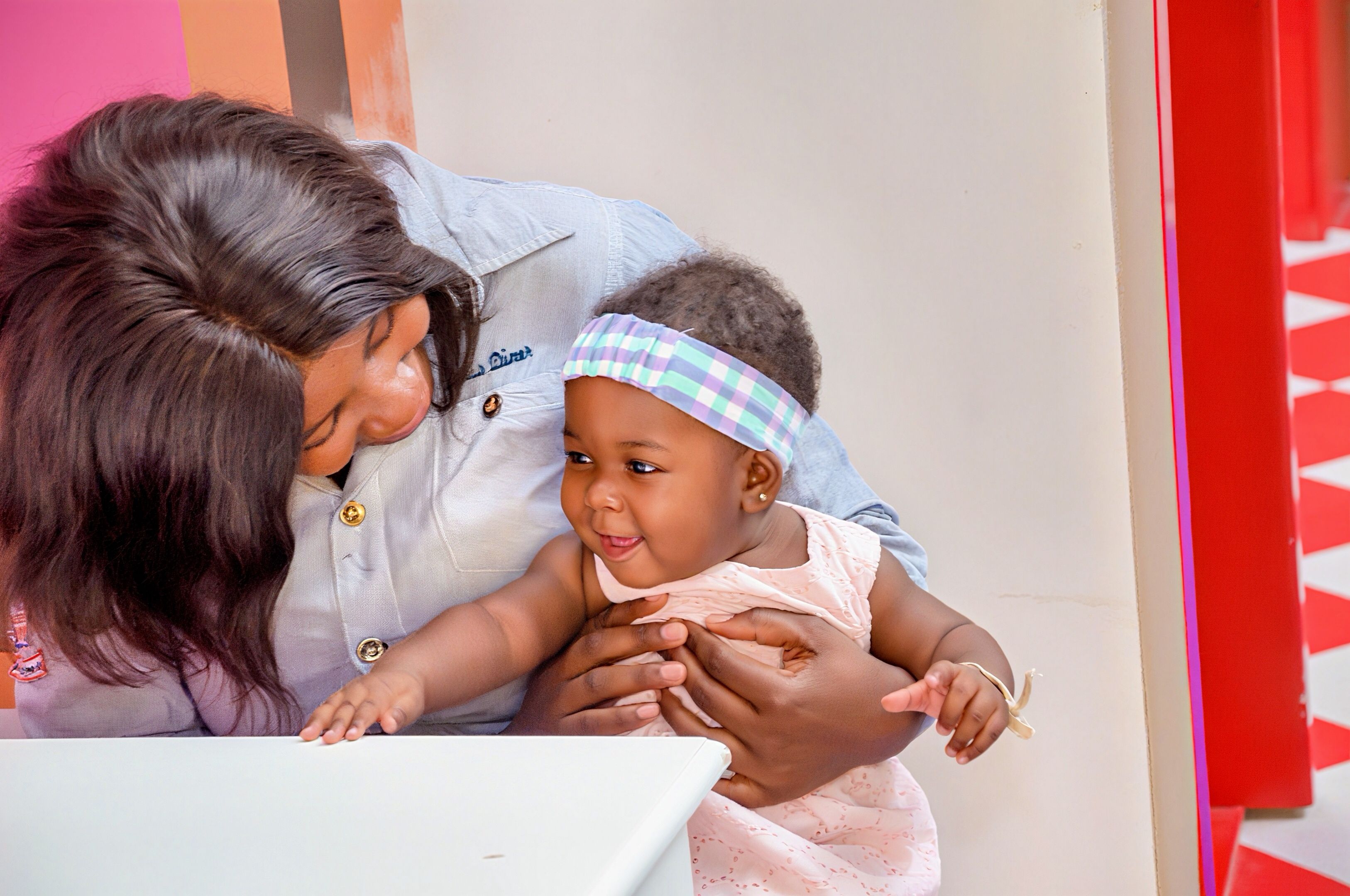 Free photo of a young mother and her baby