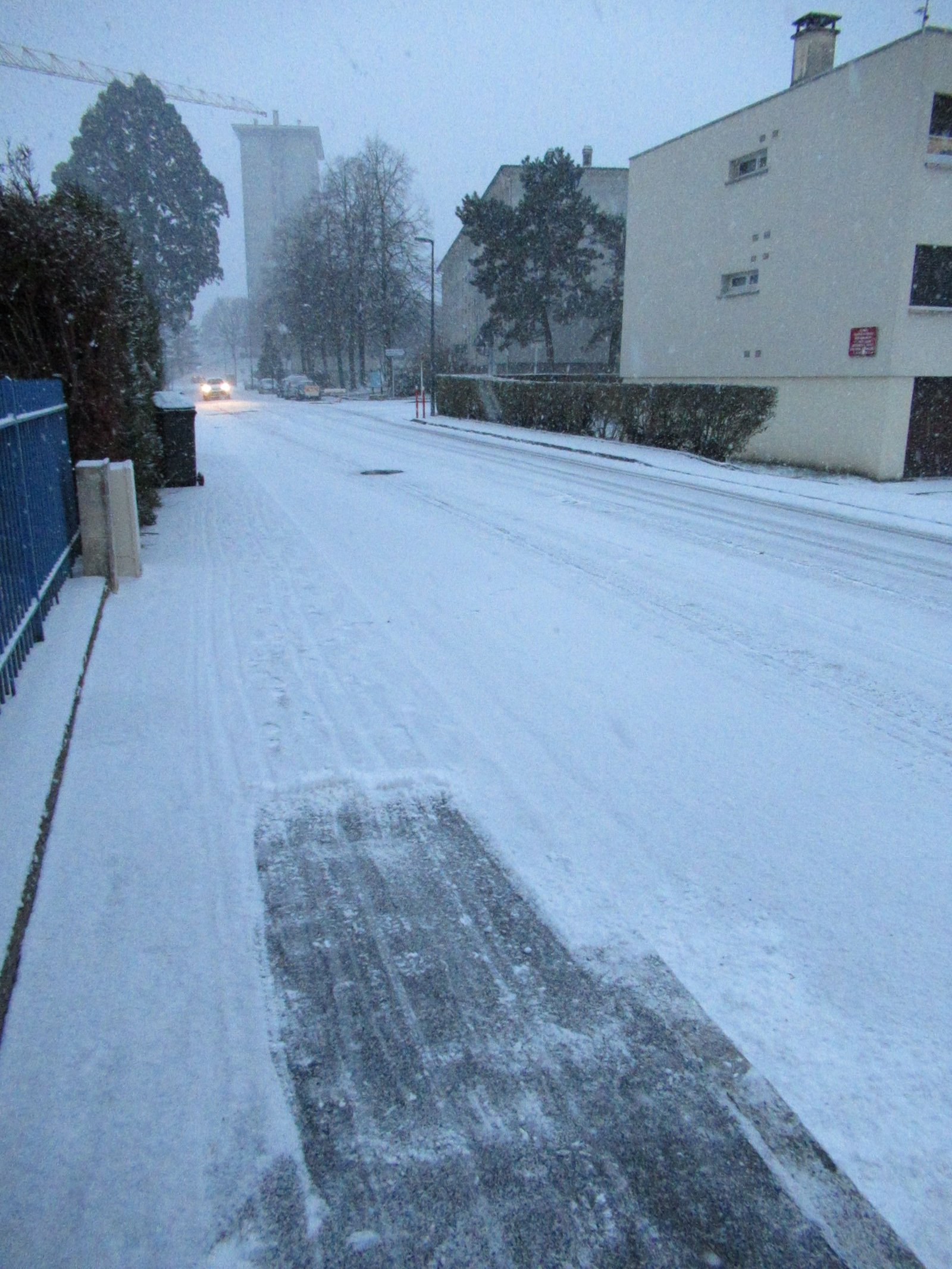 Snowfall covering a street