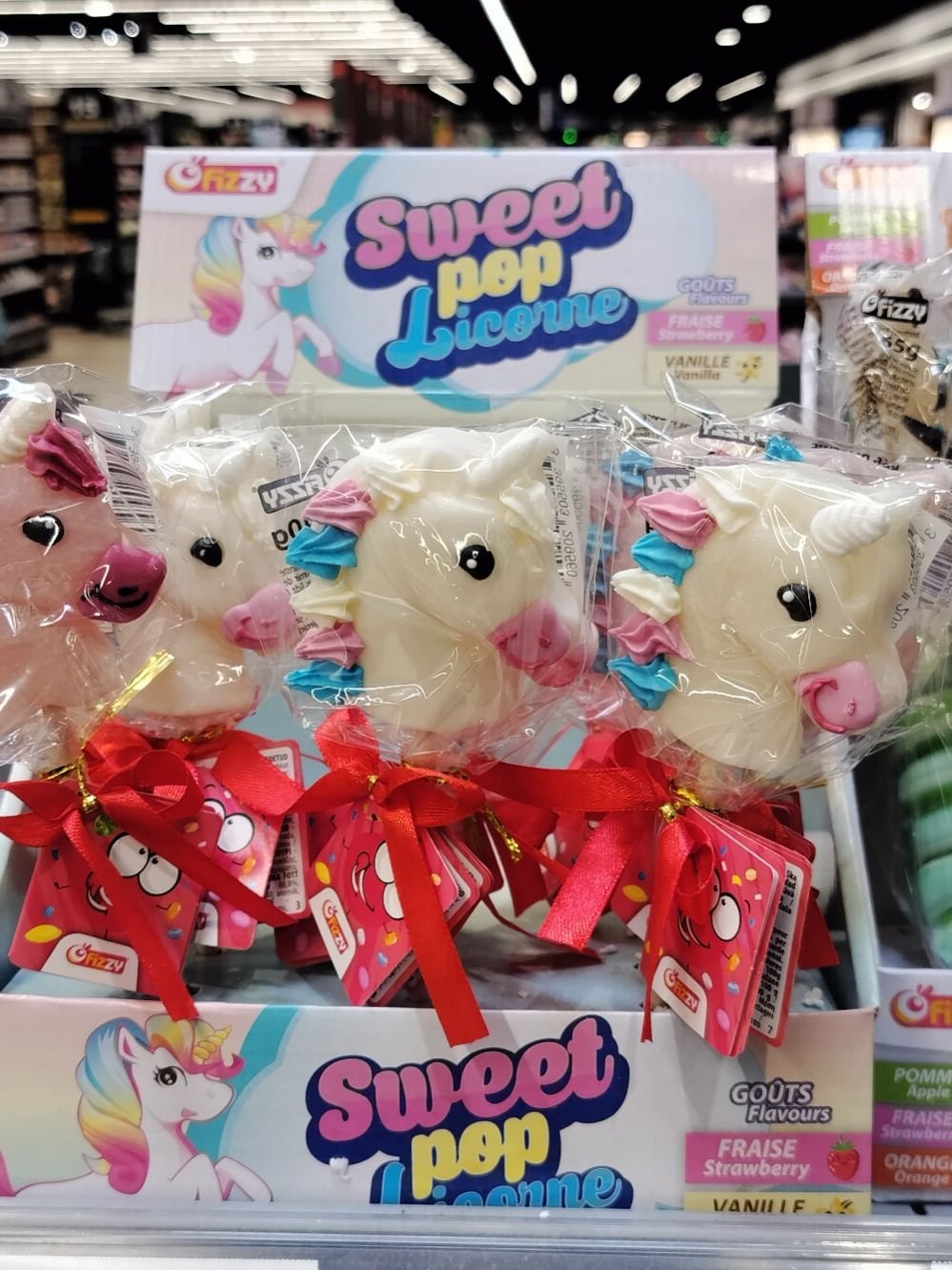 Rayon sucettes dans un supermarché