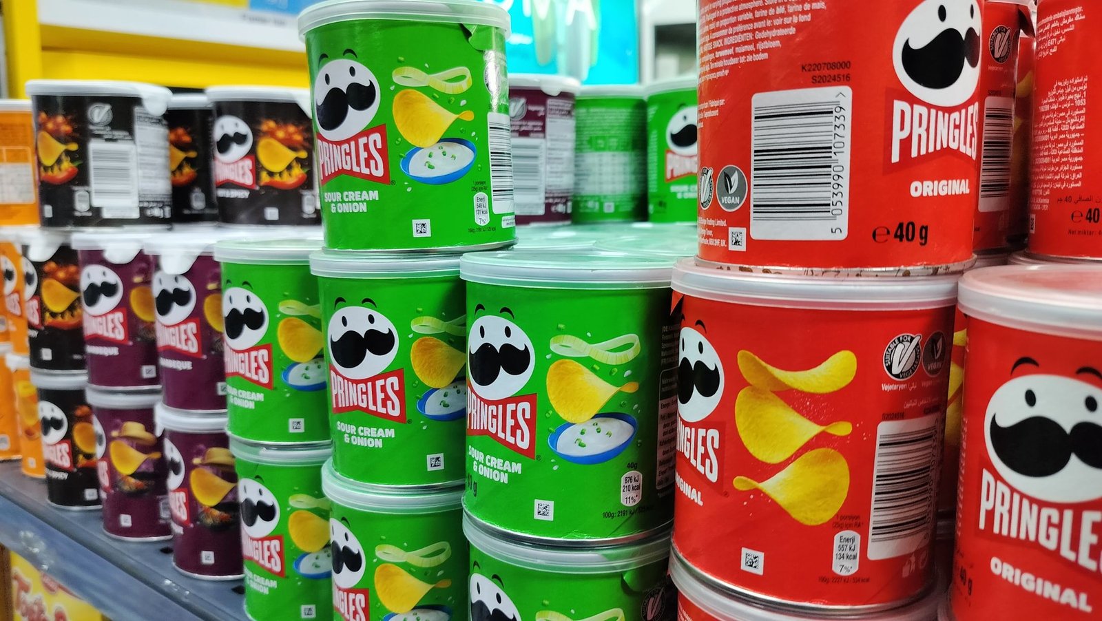 Boxes of Pringles on the shelf in a store