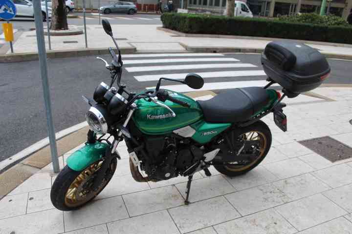 Kawasaki Z650rs motorcycle parked at the edge of a tarmac in the city of Milan Lombardy in Italy free photo