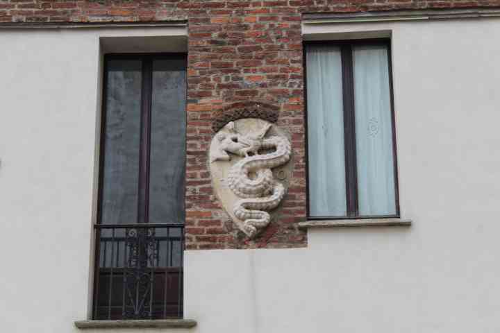 From the Biscione, a heraldic symbol depicting a snake with a child in its mouth, often associated with the city of Milan and the Visconti family, free photo...