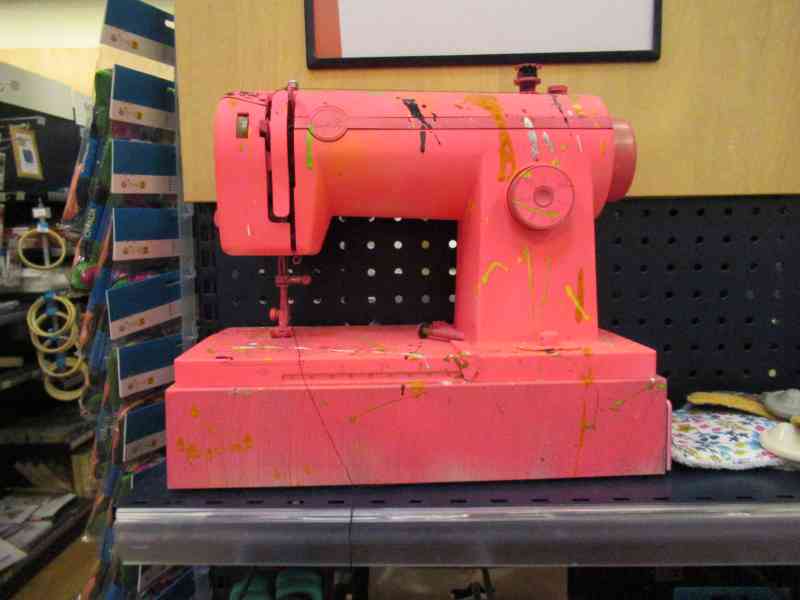Vintage sewing machine in pink color