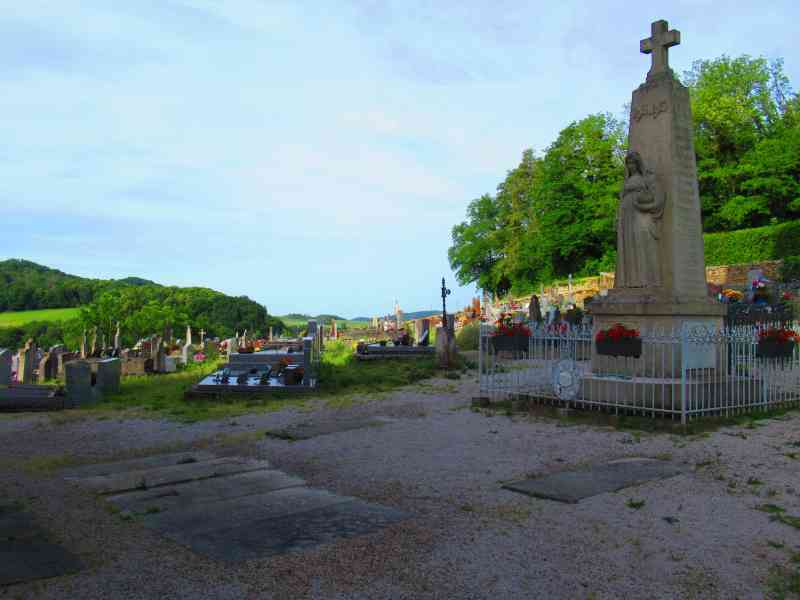 A large central monument in the cemetery, free photo
