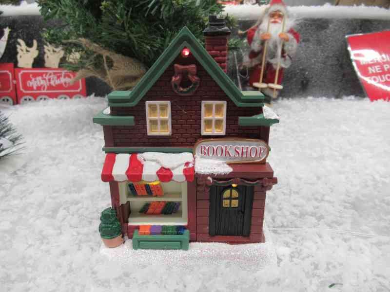Une figurine de village de Noël représentant une librairie, photo gratuite