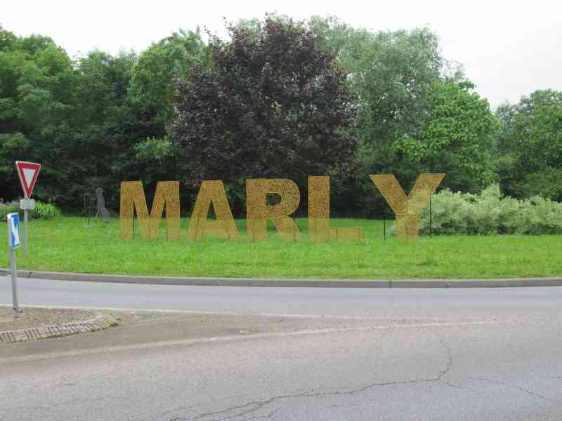 Giant relief lettering of the commune of Marly in France
