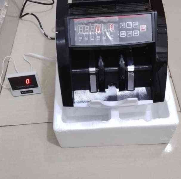 Compteuse des billets de banque photo gratuite