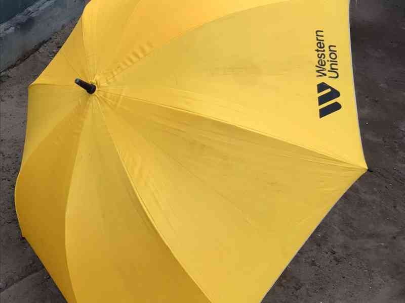 Yellow parasol, Western Union free photo