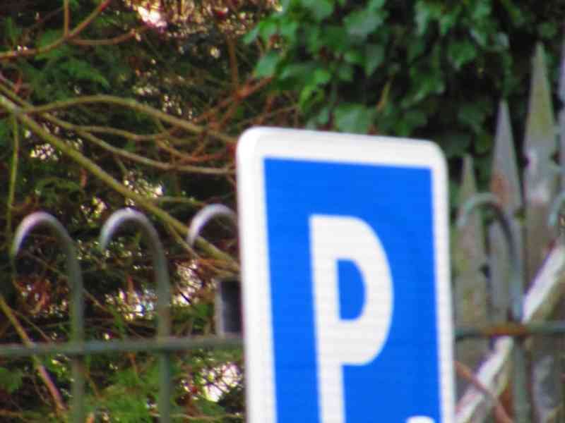 Un panneau de signalisation routière indiquant une zone de stationnement payante photo gratuite