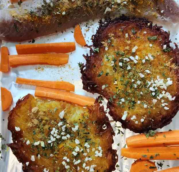 Black pollock fillet with carrots and grated potato pancakes
