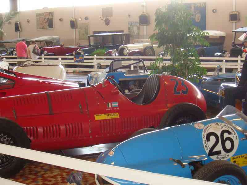 Vintage racing cars on free photo display